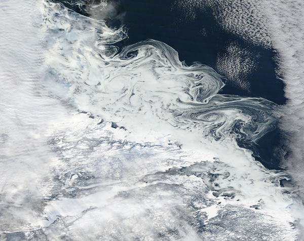 Clouds and eddies off of Newfoundland and Labrador, Canada